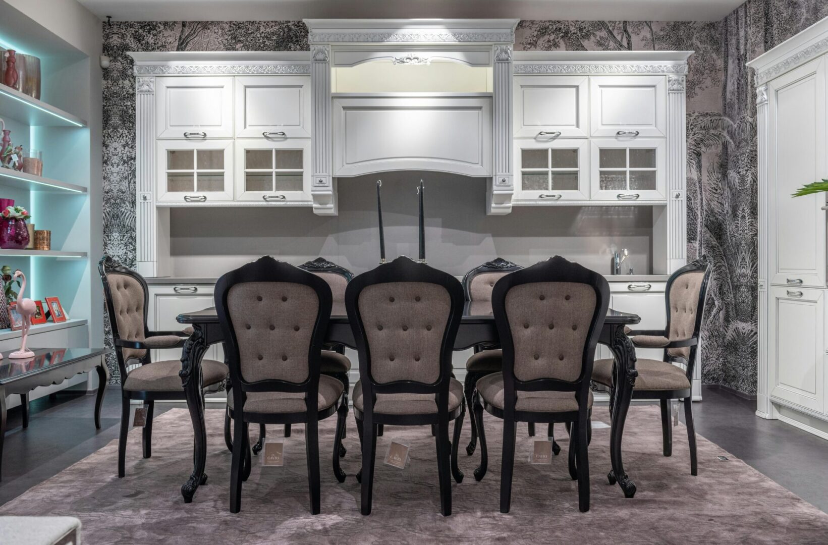 pexels-heyho-7195599 A dining room table and chairs in front of a kitchen.